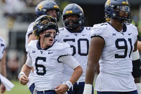West Virginia grounds UCF down to score 41 28 Big 12 road win AP